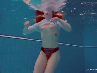 Underwater swimming femme fatale Alice Bulbul
